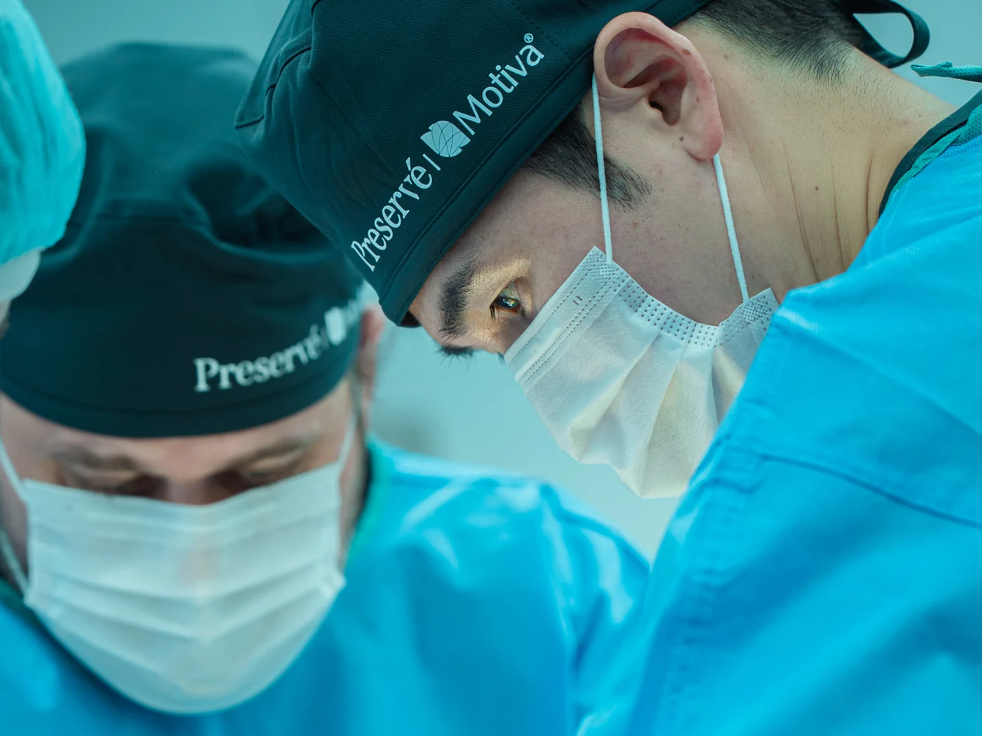 Performing Preserve breast augmentation surgery.